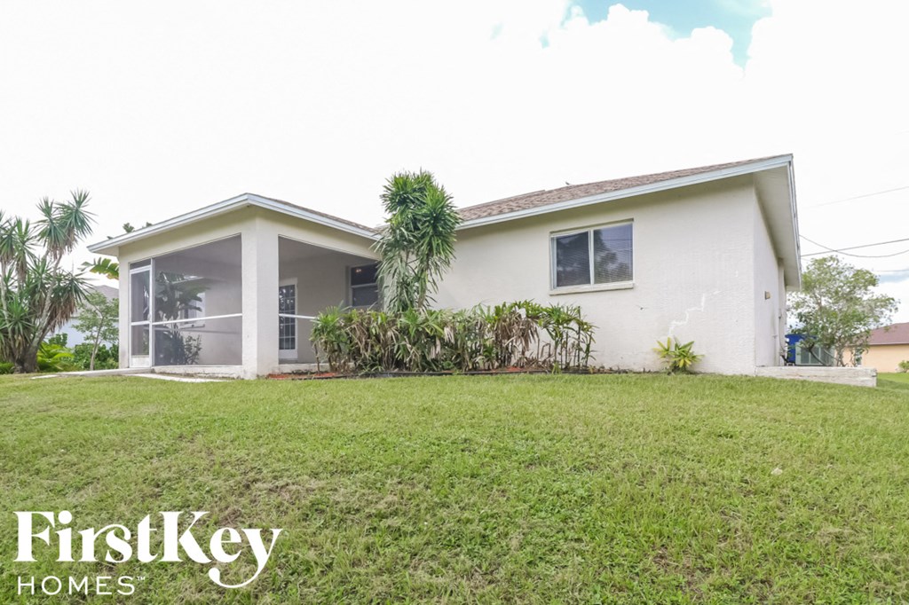 a house with a lawn in front of it