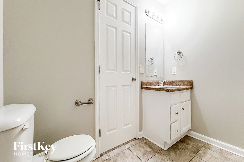 a small bathroom with a toilet and a sink