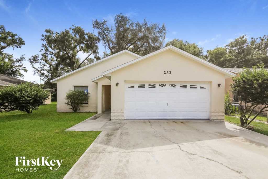 A two-car garage is attached to a house.