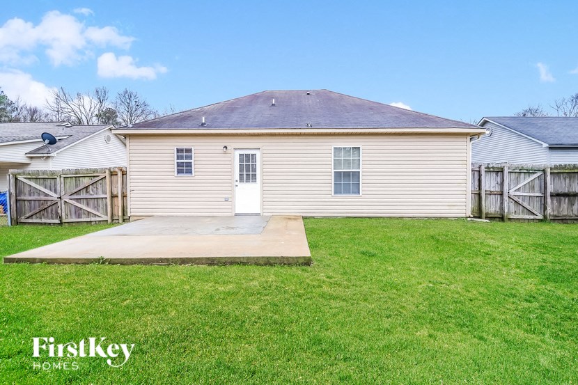 A house with a garage is for sale by FirstKey Homes.