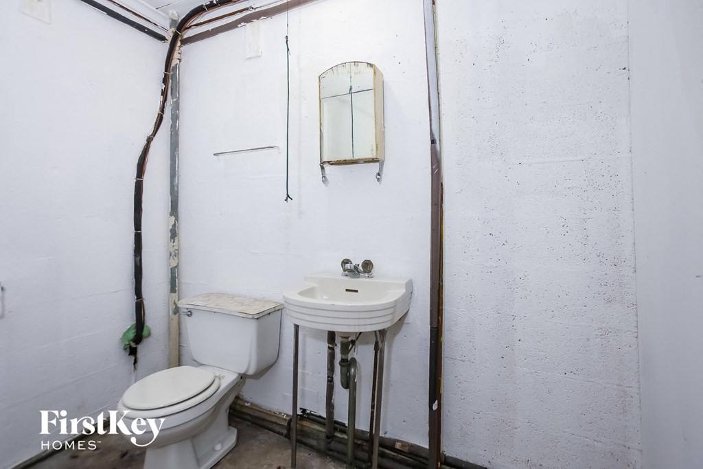 a small bathroom with a toilet and a sink