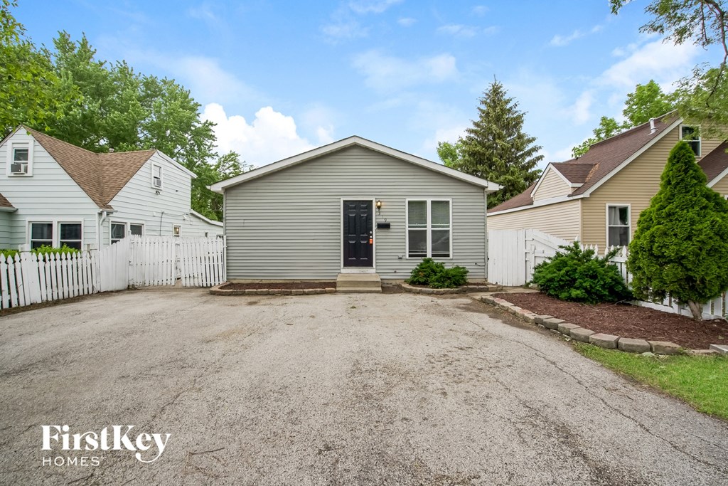 A residential area with a house and a garage.