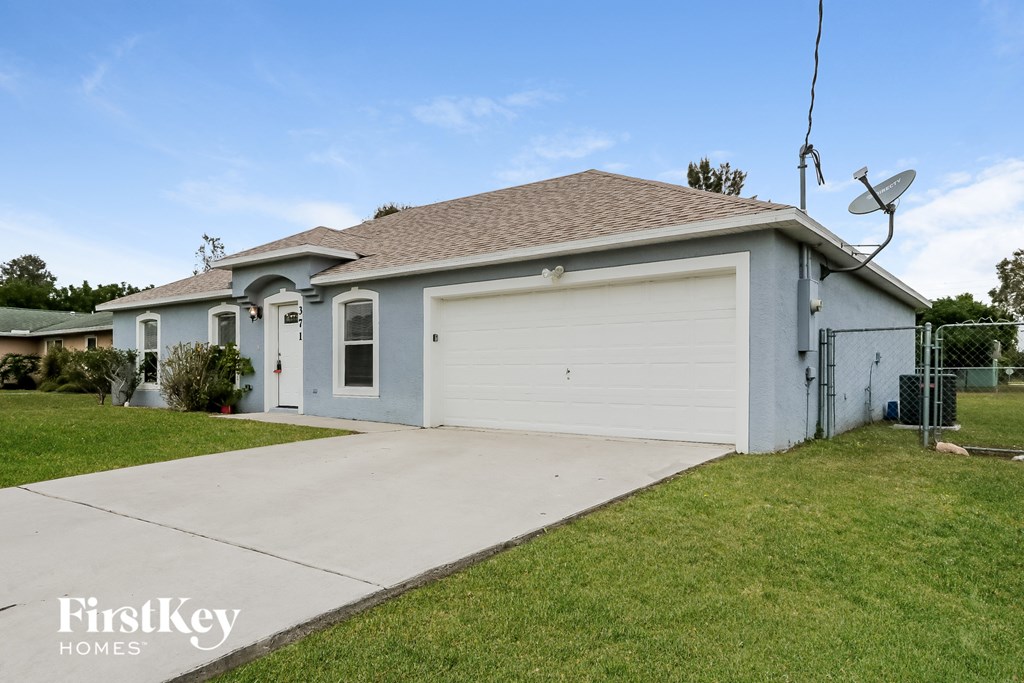A two-car garage is attached to a house.