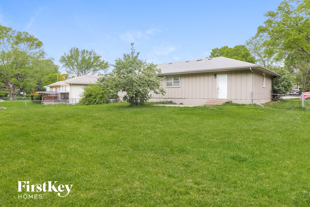 a house with a yard in front of it