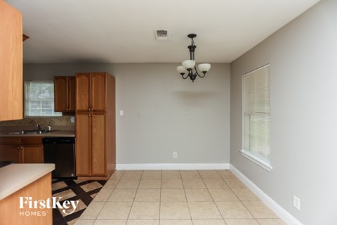 A kitchen area with a sink and a dishwasher.