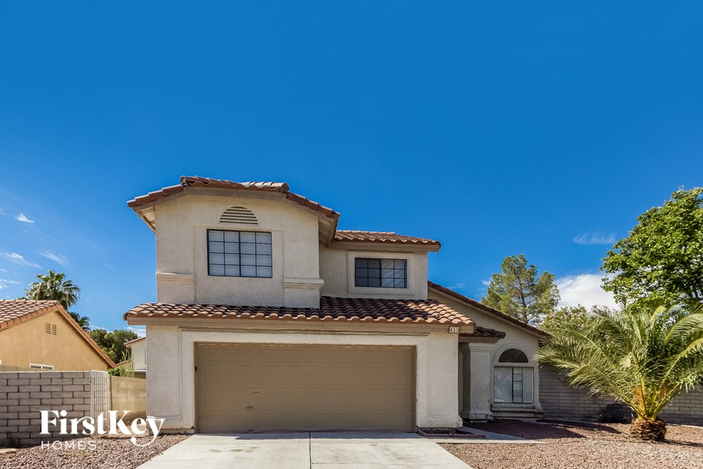 A house with a garage is for sale by FirstKey Homes.