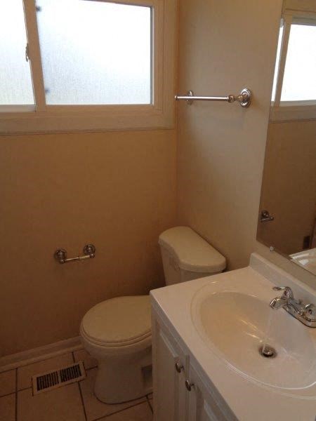 a small bathroom with a toilet and a sink