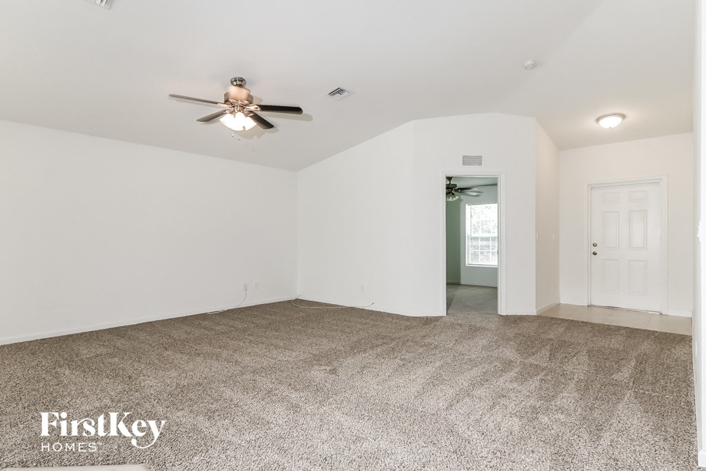 the living room is clean and ready for us to move in