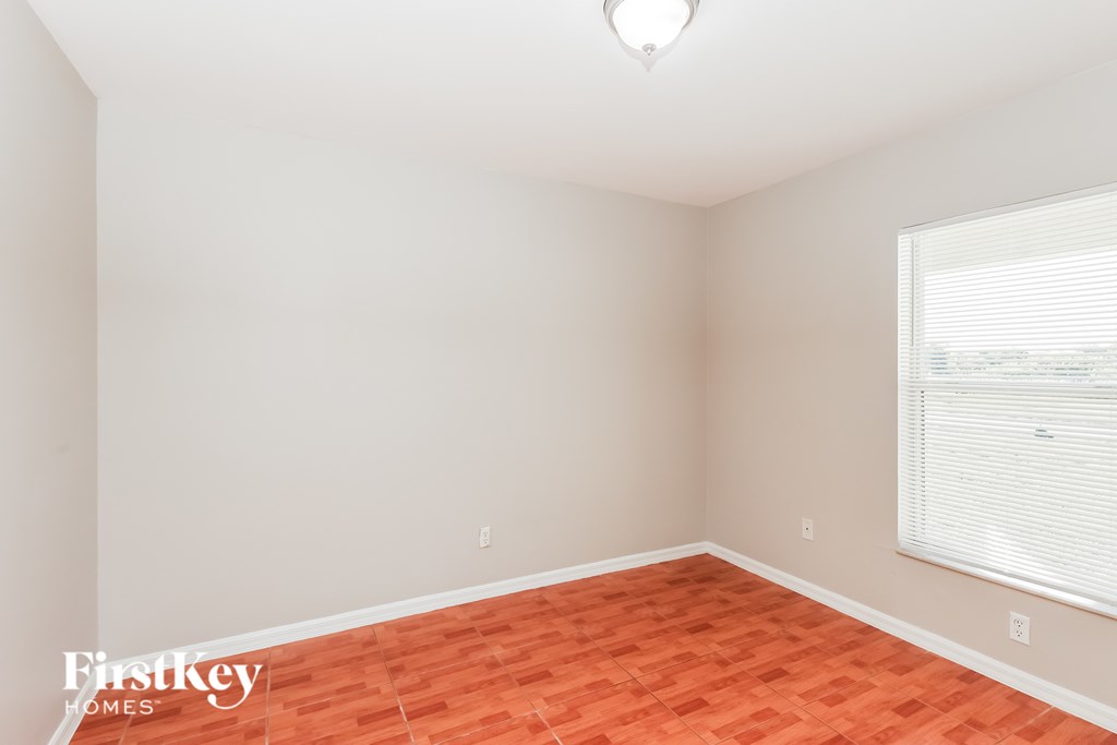 A room with a First Key Homes logo on the floor.