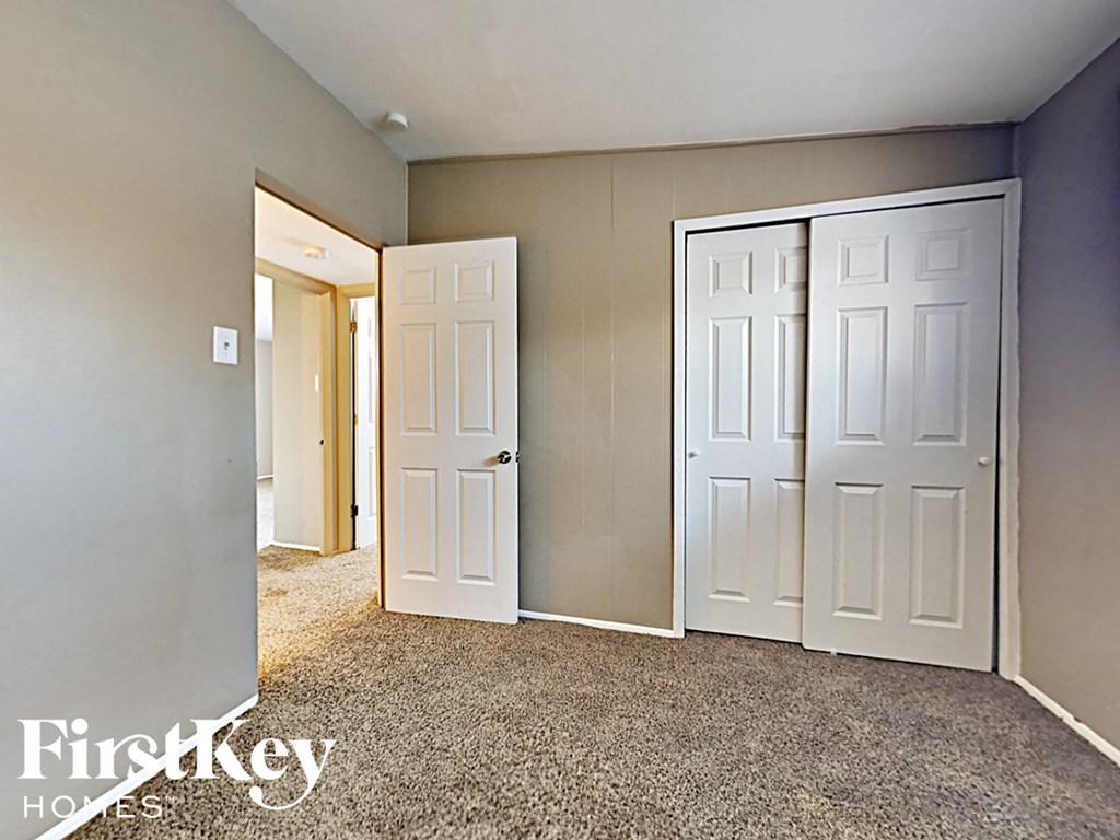 the master bedroom has two closets and two doors