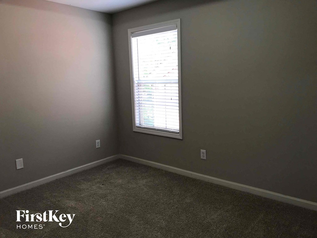 a empty room with a window in it