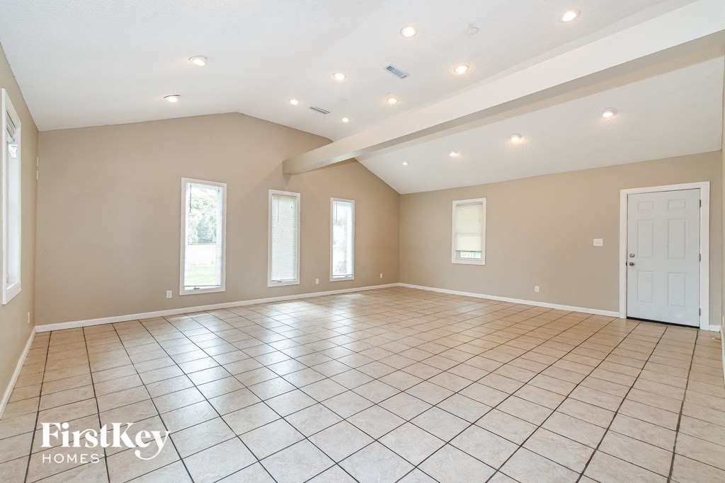 the spacious living room is clean and ready for you to use