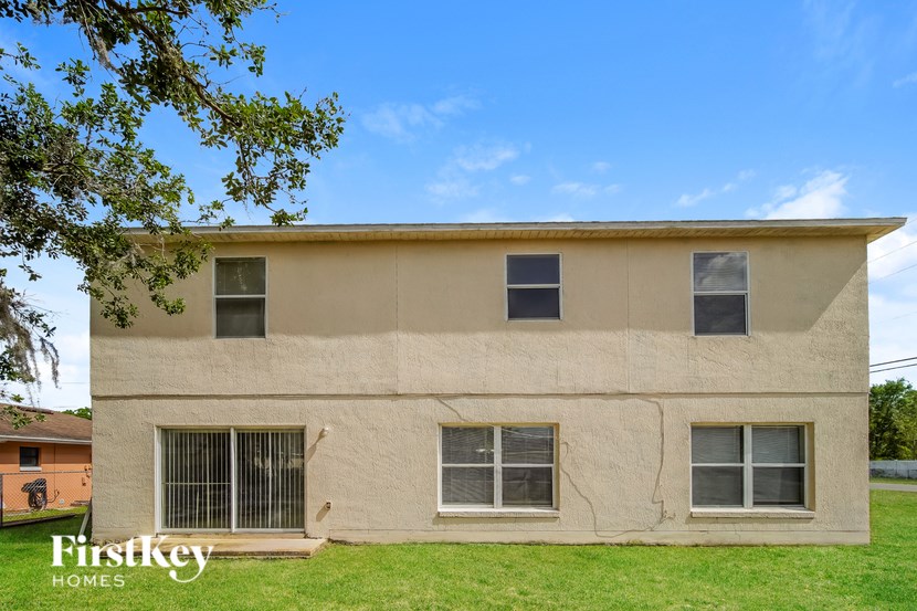 A beige house with the words "Firstkey Homes" on the bottom left.