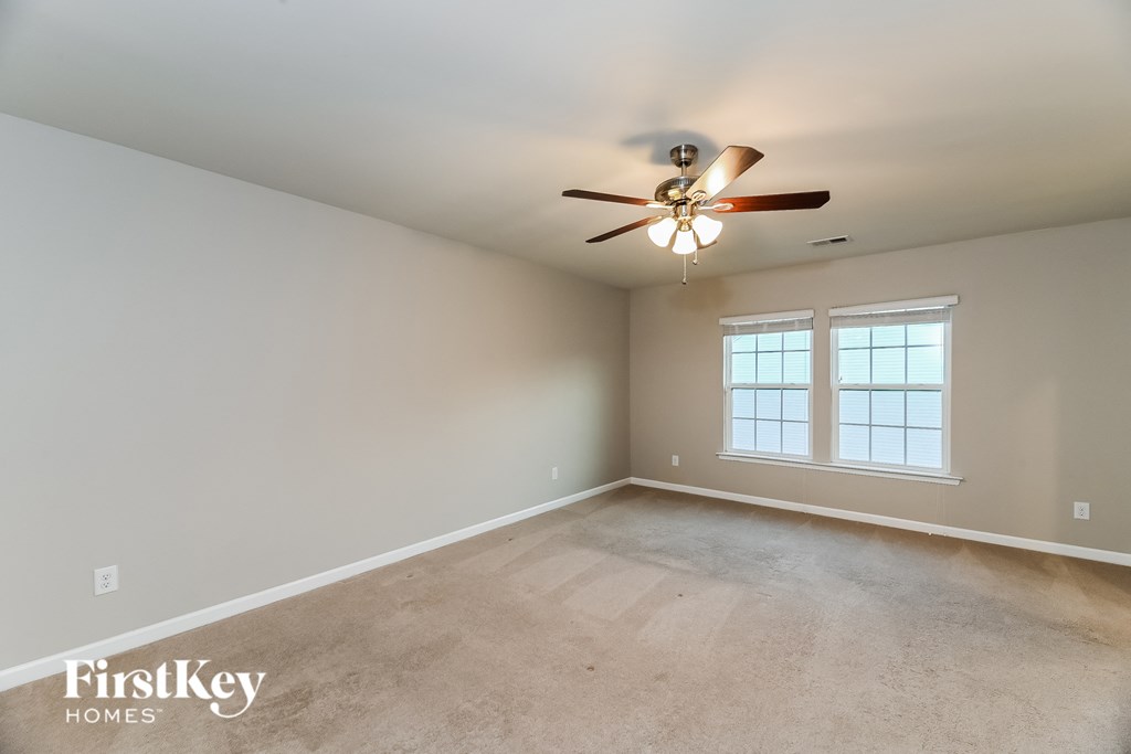 the spacious living room is clean and ready to use