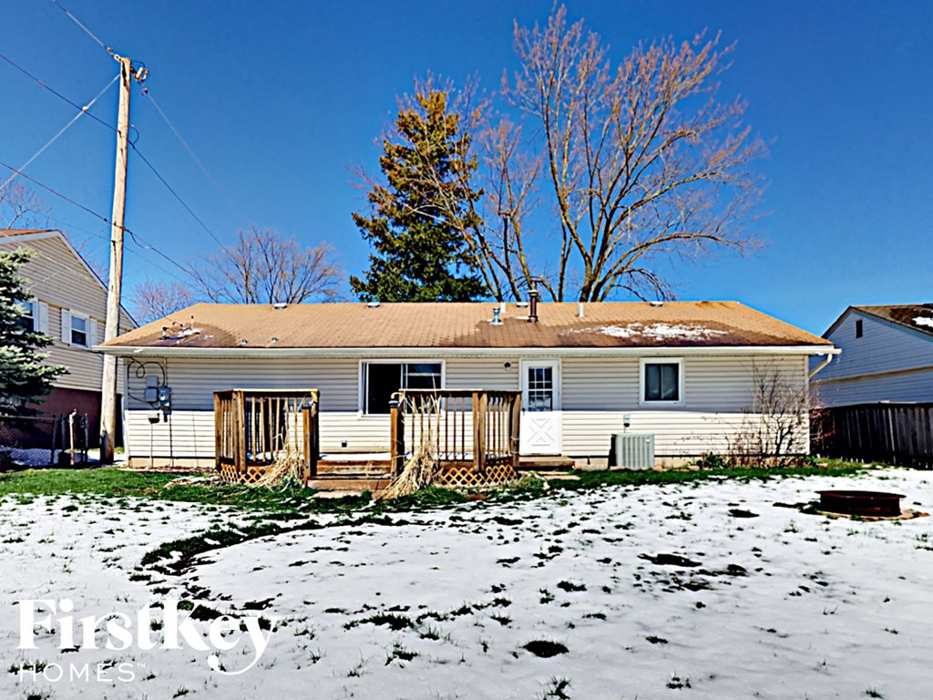 a house with snow on the ground