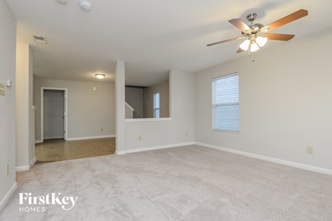 the living room and dining room are spacious and clean