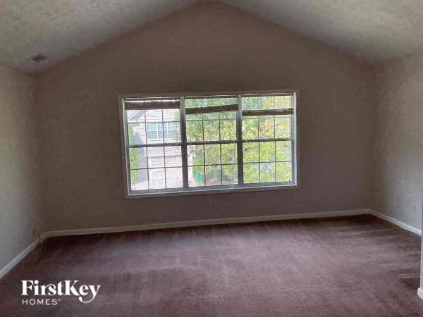 an empty room with a large window in it