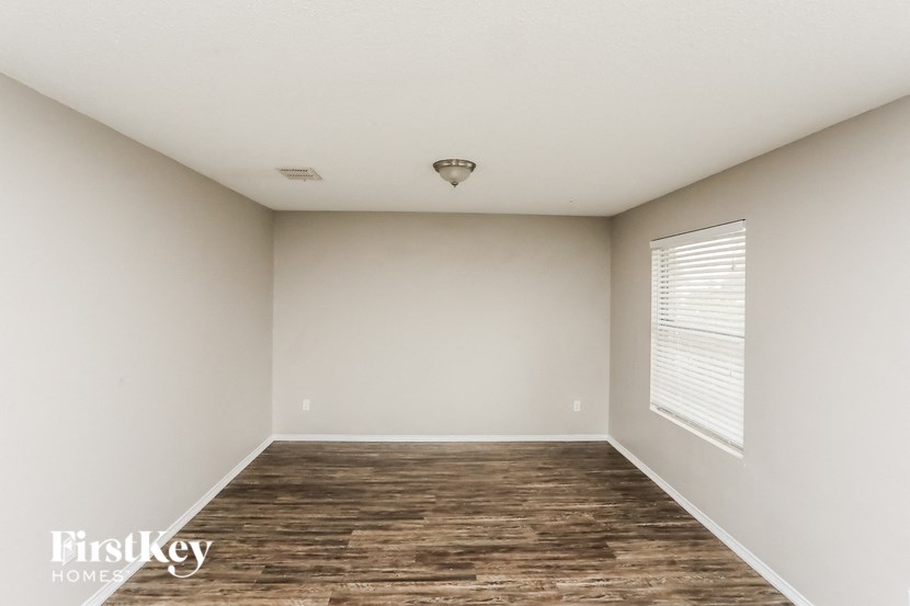 the living room is clean and ready for us to move in