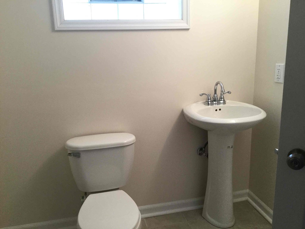 a small bathroom with a toilet and a sink