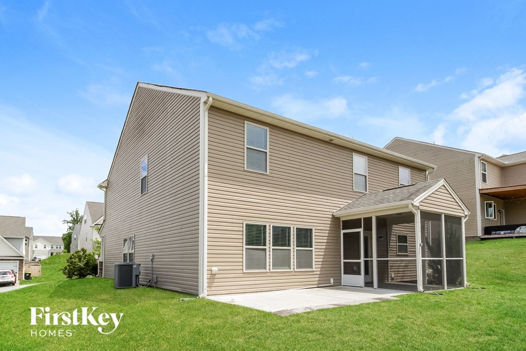 A house with a garage is for sale by FirstKey Homes.