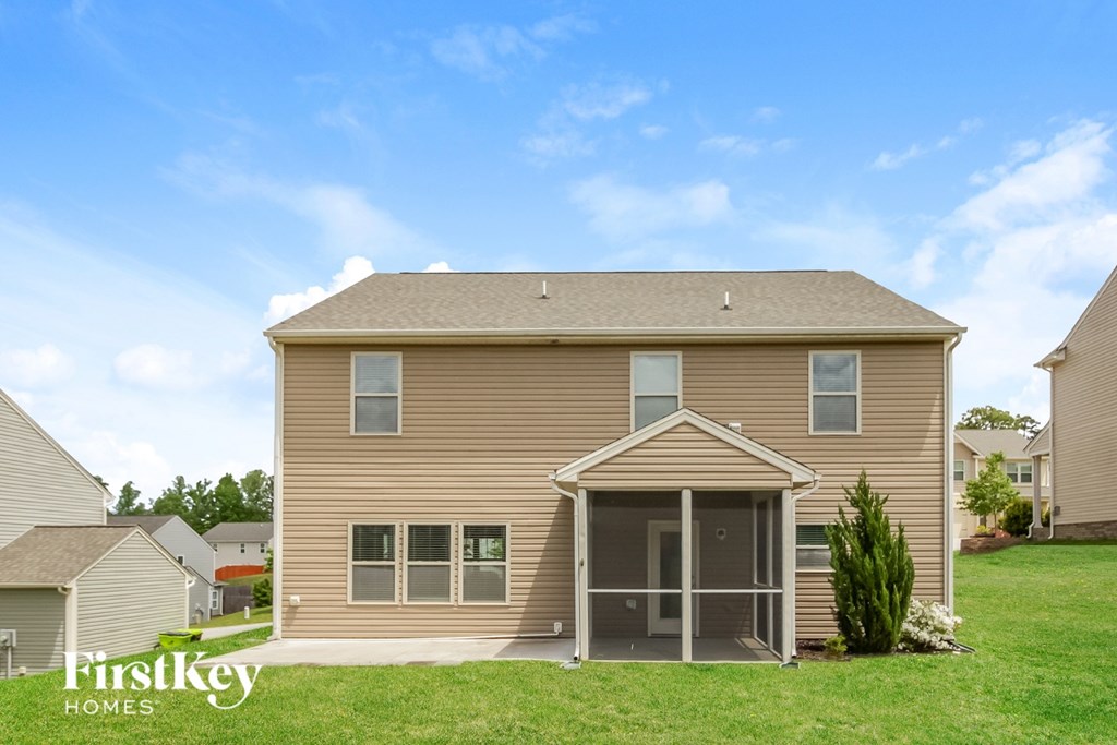 A house with a garage is for sale by FirstKey Homes.