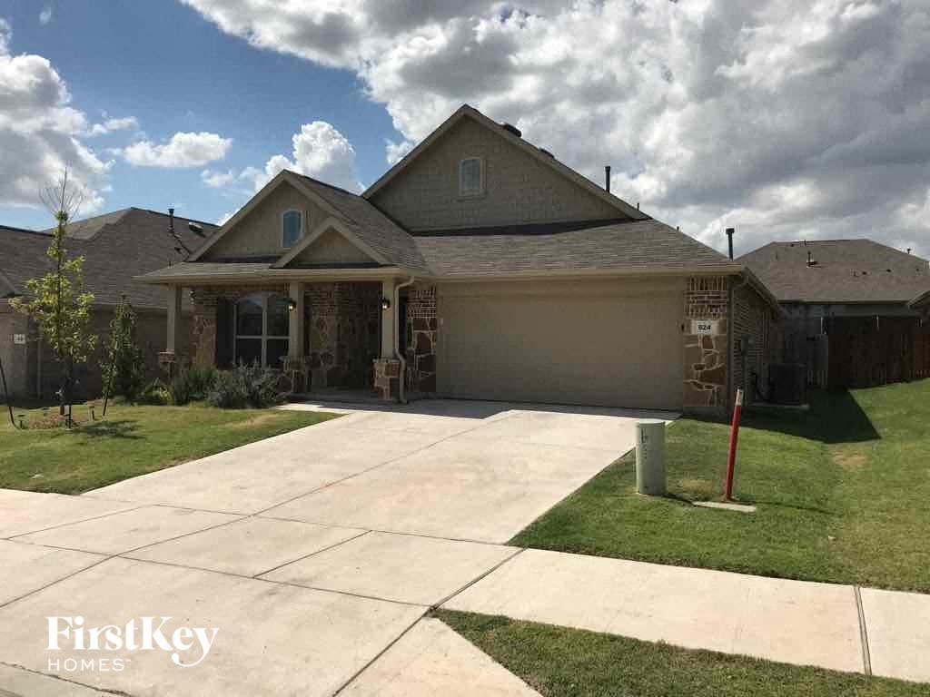 a house with a driveway in front of it
