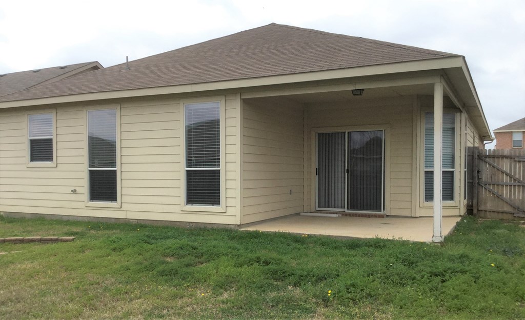 the front of a house with a porch