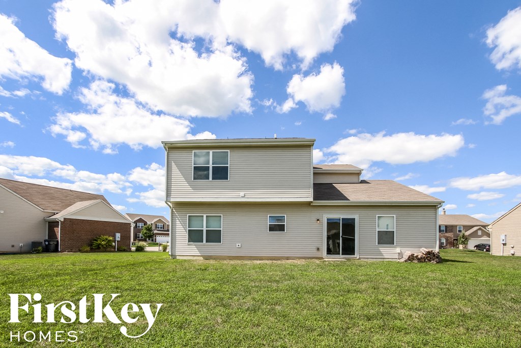 a house with a yard in front of it
