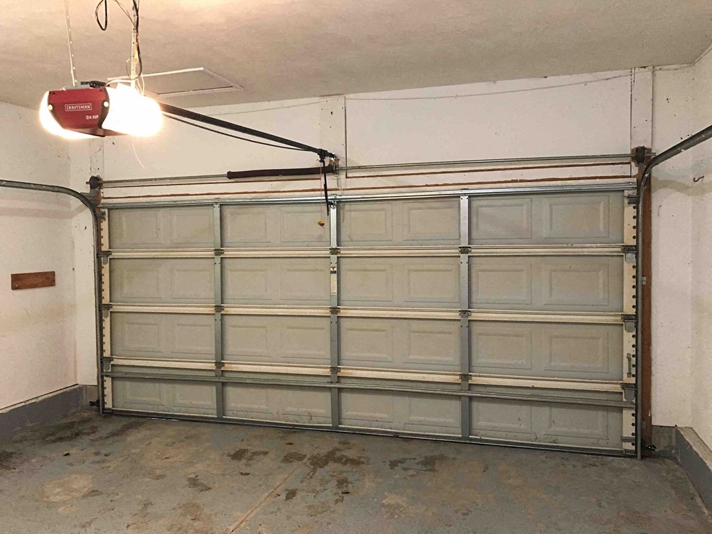 a row of garage doors in a garage