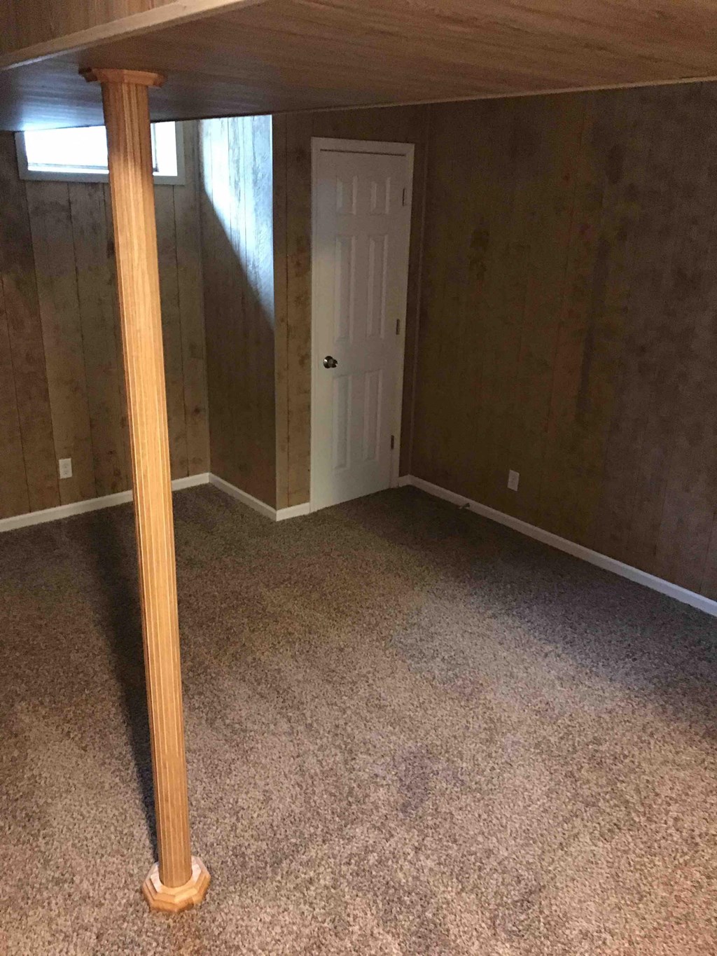 a room with a table and a door in it