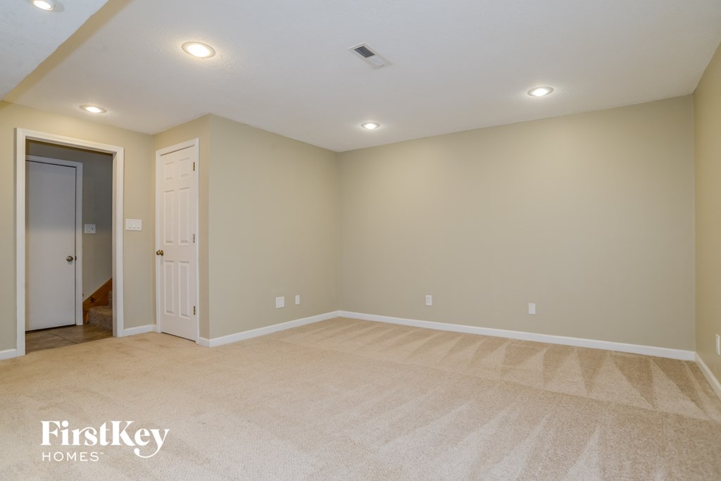 the second bedroom is spacious and has a door to the hallway