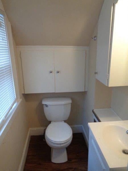 a small bathroom with a toilet and a sink