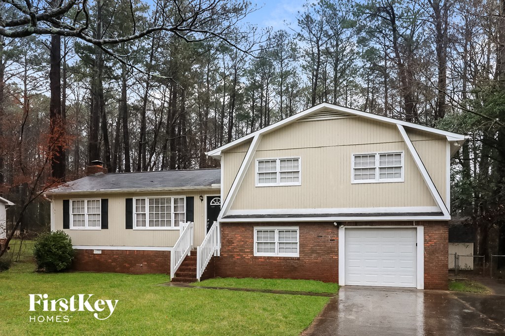 A house with a garage is shown in the image.