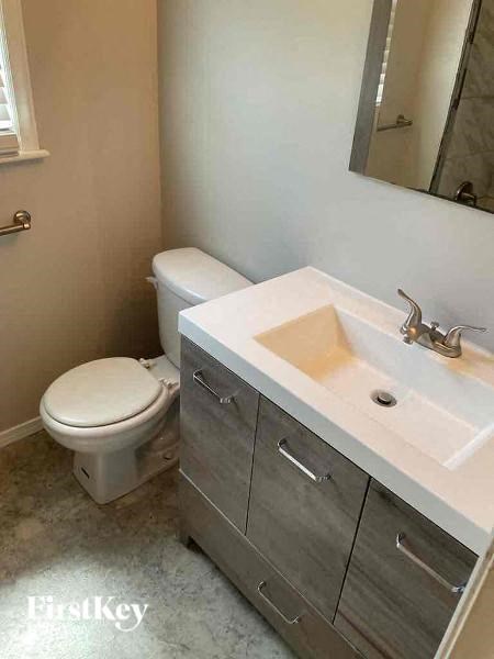 a bathroom with a sink and a toilet