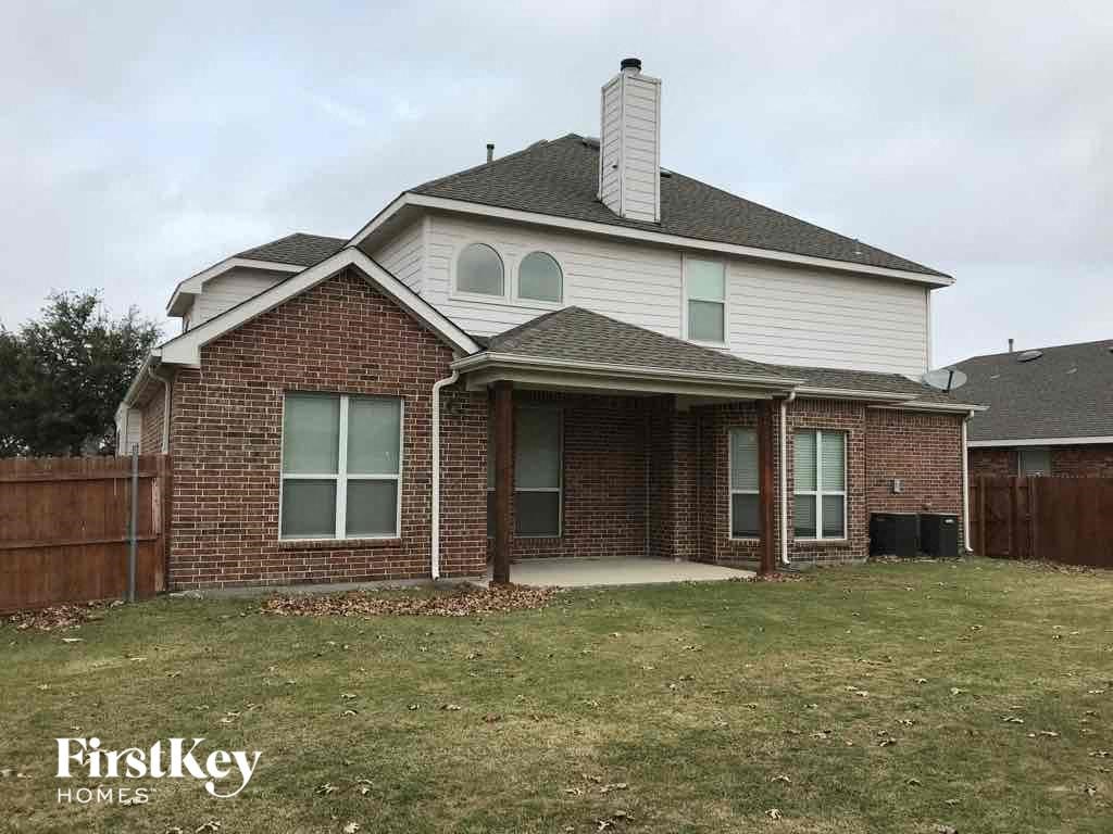 a house with a yard in front of it