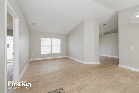 the living room and dining room are spacious and clean
