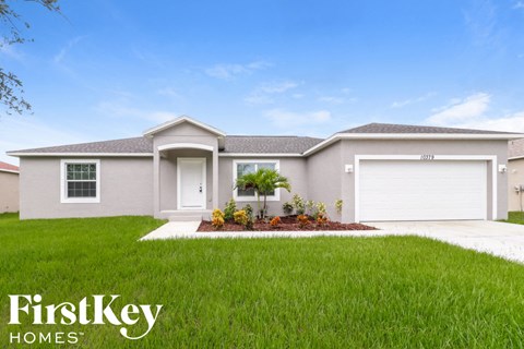 a house with a lawn in front of it