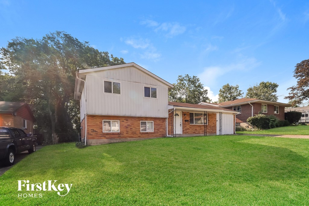 A house with a garage is for sale by FirstKey Homes.