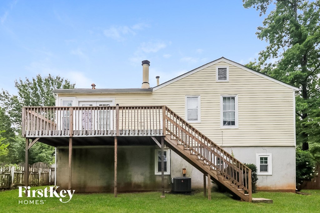 A house with a staircase leading to the second floor.