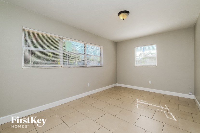 A room with a FirstKey Homes logo on the floor.