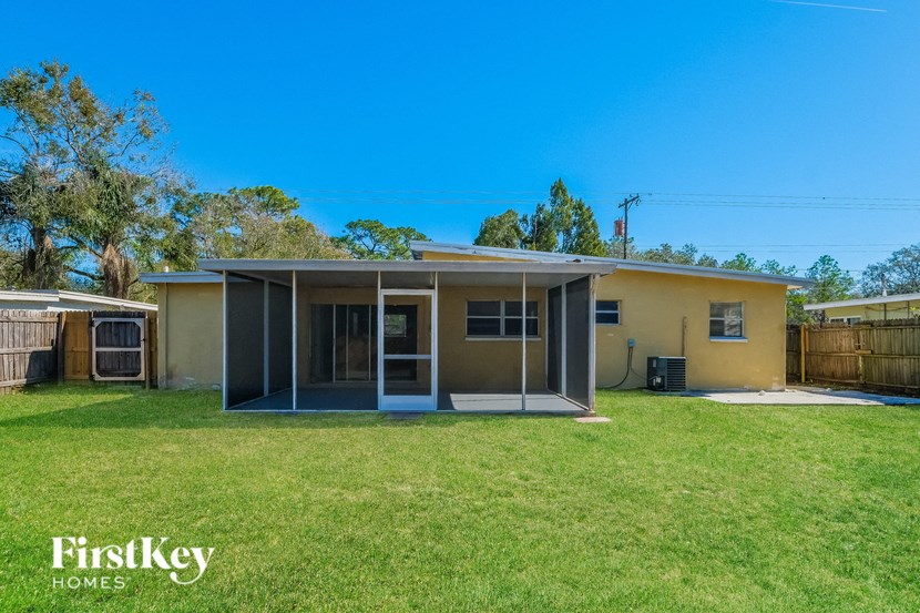A house with a blue sky in the background.