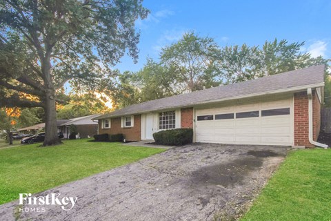 A house with a garage is for sale by FirstKey Homes.