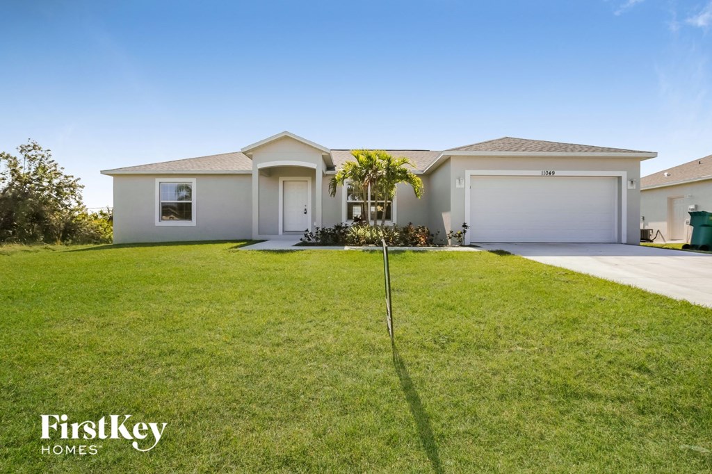 a house with a lawn in front of it