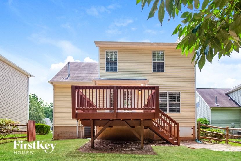 a deck in the back of a house