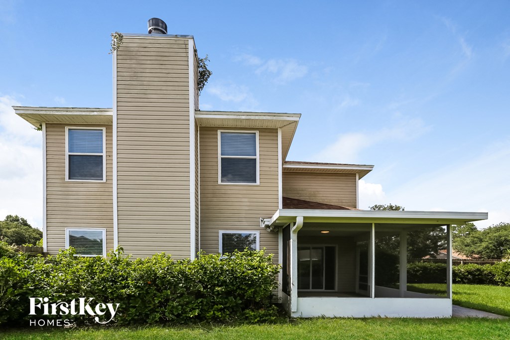 a house with a tall tower on top of it