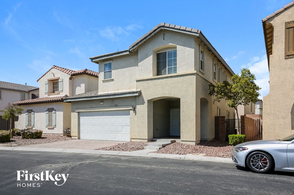 a house with a car parked in front of it