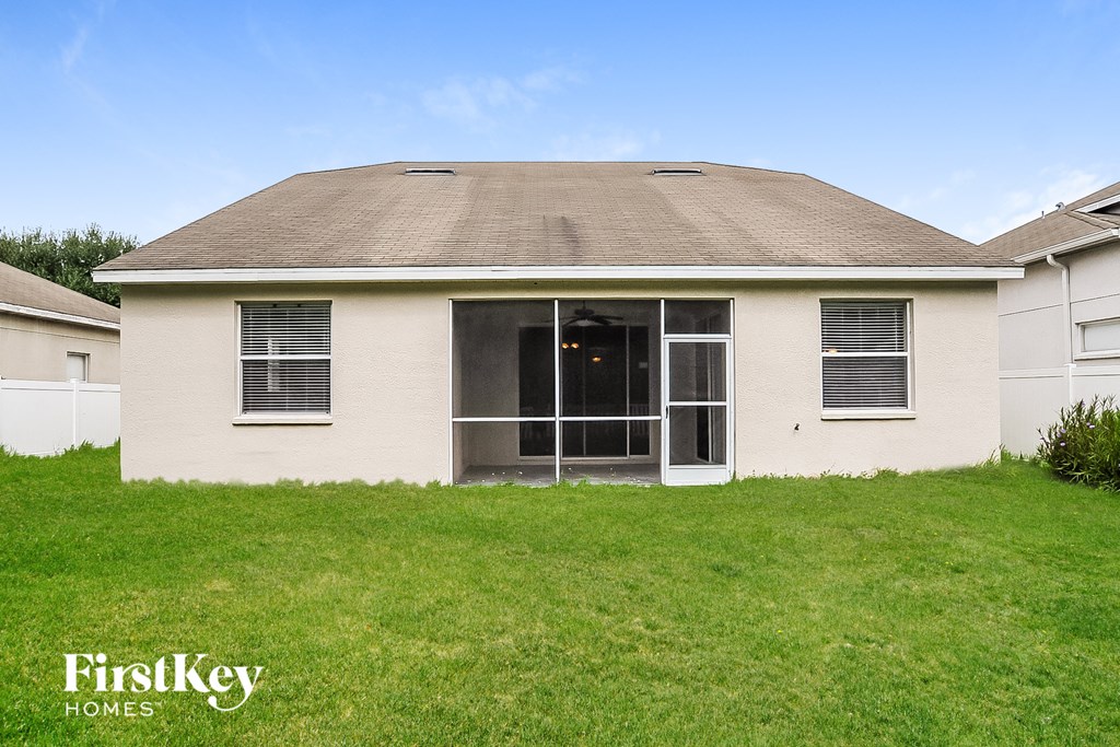 the front of a house with an open door