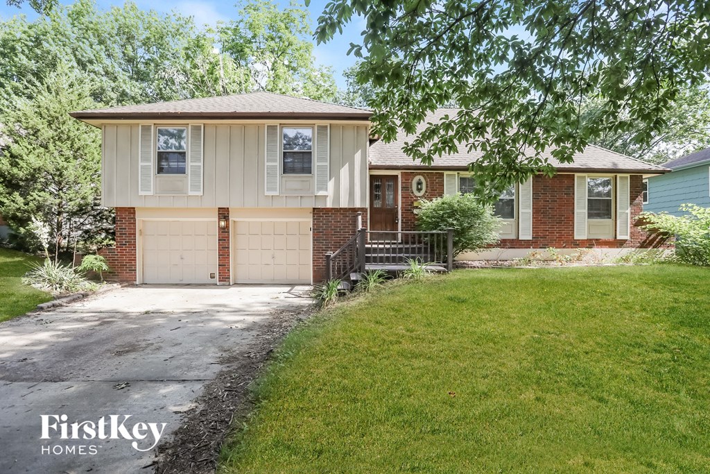 A house with a garage is for sale by FirstKey Homes.