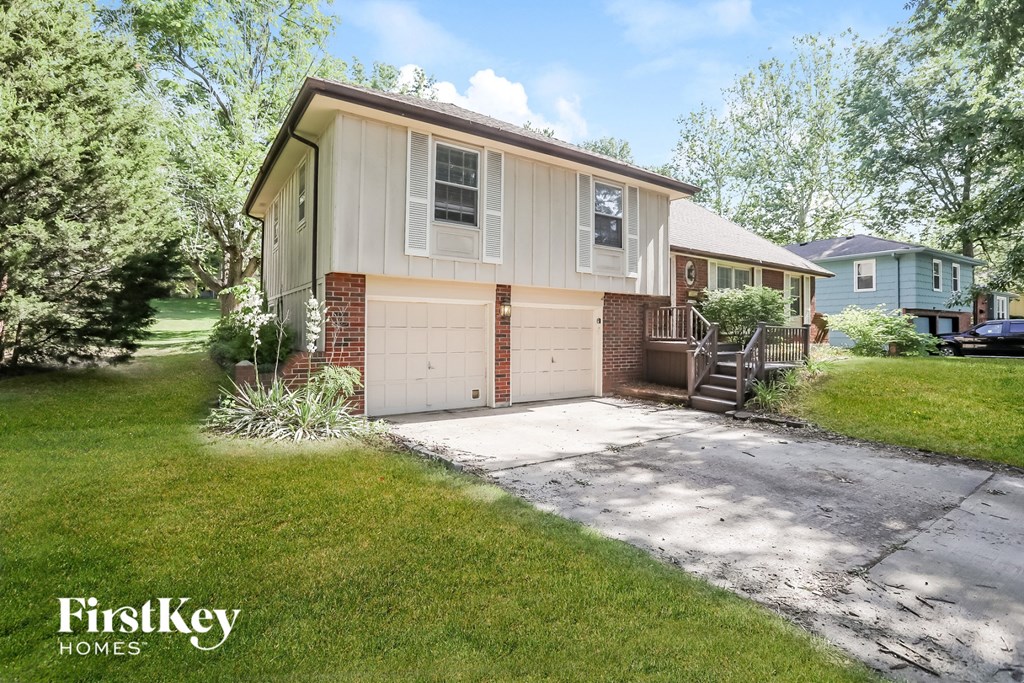 A house with a garage is for sale by FirstKey Homes.