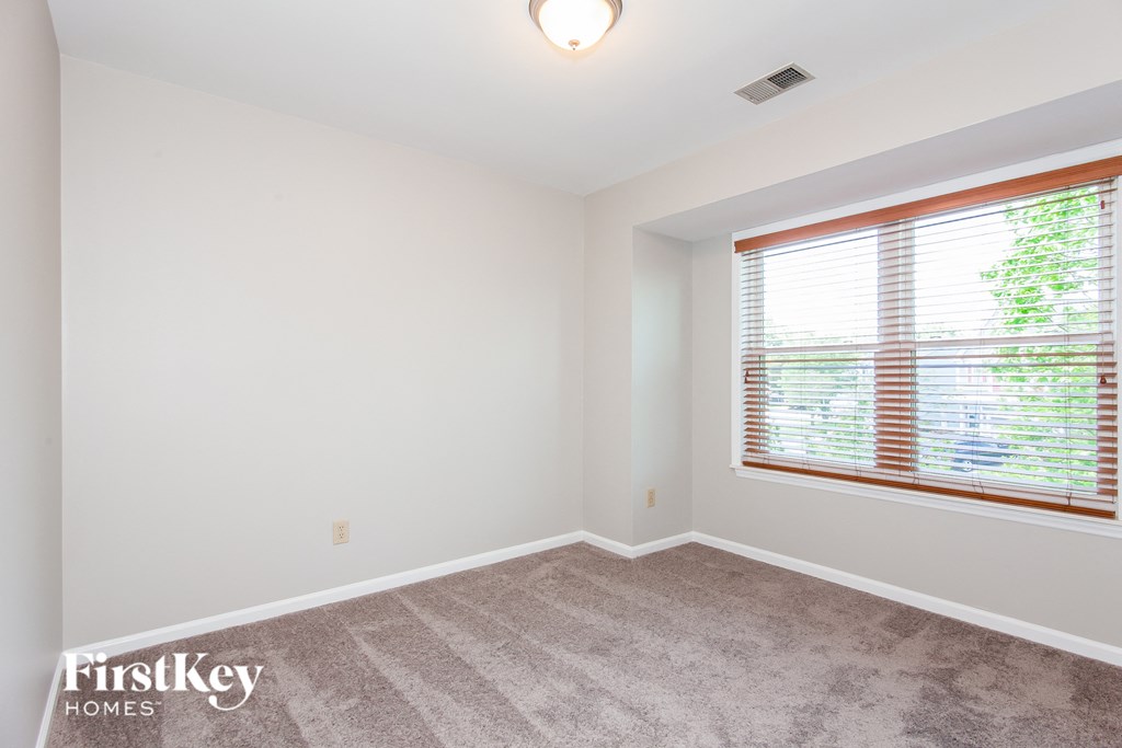 the living room is clean and ready to use